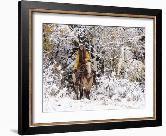 Cowgirl Riding in Autumn Aspens with a Fresh Snowfall-Terry Eggers-Framed Photographic Print