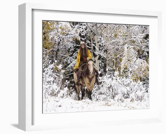 Cowgirl Riding in Autumn Aspens with a Fresh Snowfall-Terry Eggers-Framed Photographic Print