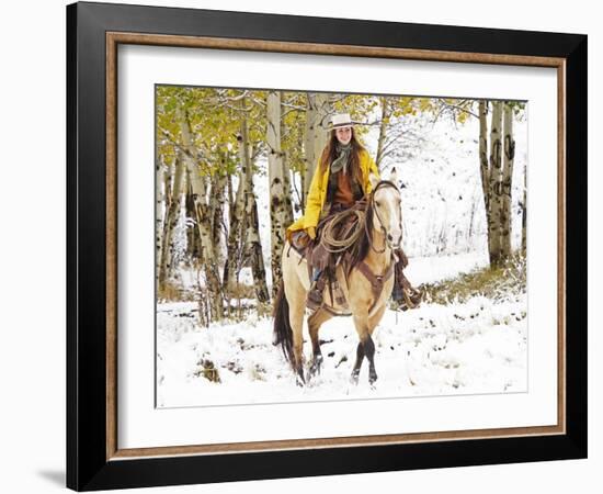 Cowgirl Riding in Autumn Aspens with a Fresh Snowfall-Terry Eggers-Framed Photographic Print