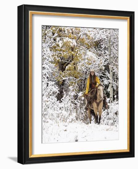 Cowgirl Riding in Autumn Aspens with a Fresh Snowfall-Terry Eggers-Framed Photographic Print