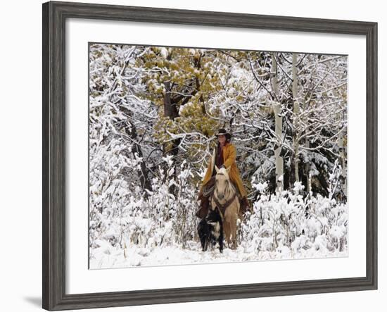 Cowgirl Riding in Autumn Aspens with a Fresh Snowfall-Terry Eggers-Framed Photographic Print