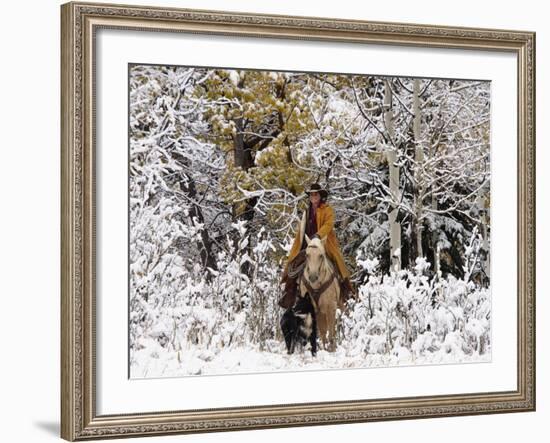 Cowgirl Riding in Autumn Aspens with a Fresh Snowfall-Terry Eggers-Framed Photographic Print