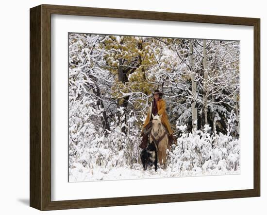 Cowgirl Riding in Autumn Aspens with a Fresh Snowfall-Terry Eggers-Framed Photographic Print