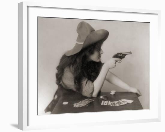 Cowgirl with Deck of Cards and Chips, Pointing a Pistol, 1912-null-Framed Photo