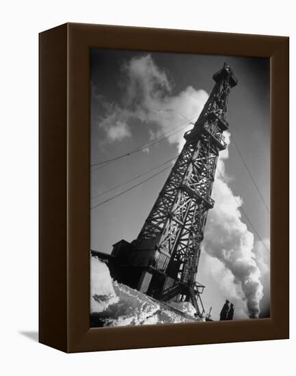 Creditul Minier Oil Well Watched over by Armed Guards 17 Kilometers from Ploesti in a Oil Field-Margaret Bourke-White-Framed Premier Image Canvas