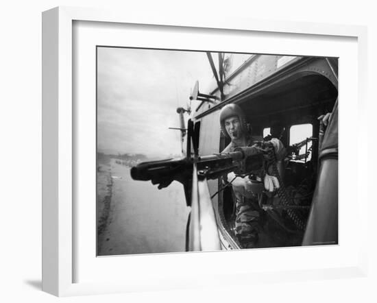 Crew Chief Lance Cpl. James C. Farley Manning Helicopter Machine Gun of Yankee Papa 13-Larry Burrows-Framed Photographic Print