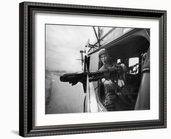 Crew Chief Lance Cpl. James C. Farley Manning Helicopter Machine Gun of Yankee Papa 13-Larry Burrows-Framed Photographic Print