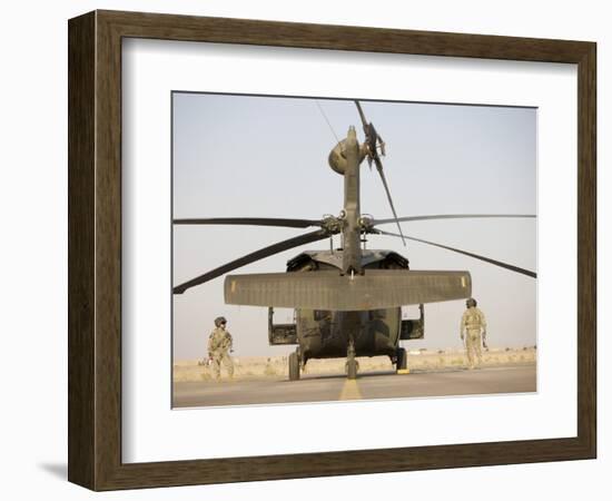 Crew Chiefs Stand Beside their UH-60L Black Hawk Helicopter-null-Framed Photographic Print