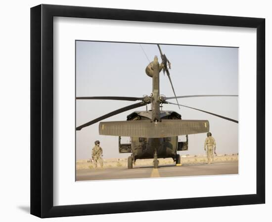 Crew Chiefs Stand Beside their UH-60L Black Hawk Helicopter-null-Framed Photographic Print