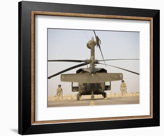 Crew Chiefs Stand Beside their UH-60L Black Hawk Helicopter-null-Framed Photographic Print