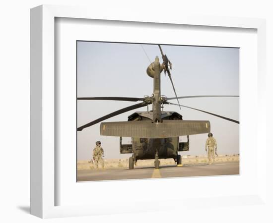 Crew Chiefs Stand Beside their UH-60L Black Hawk Helicopter-null-Framed Photographic Print