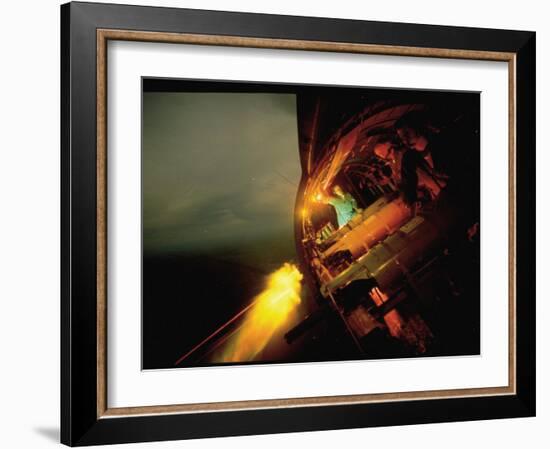 Crew of American AC47 Gunship Firing 7.62 MM Miniguns on a Night Mission During the Vietnam War-Larry Burrows-Framed Photographic Print