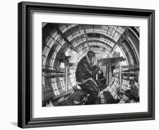 Crewman Poking His 50 Cal. Machine Gun Out of Side Window of B-17E Flying Fortress During WWII-Frank Scherschel-Framed Photographic Print