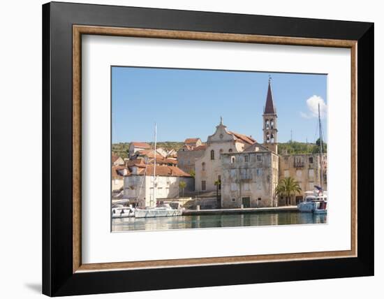 Croatia, Brac, Milna. Church of our Lady of the Annunciation 18th century dominates waterfront.-Trish Drury-Framed Photographic Print