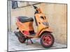 Croatia, Hvar. Bright orange vespa bike in the town of Hvar. (Editorial Use Only)-Julie Eggers-Mounted Photographic Print