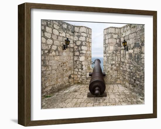 Croatia, Hvar. Cannon overlooking the town and coastline from Hvar Fortica or Spanjola Fortress.-Julie Eggers-Framed Photographic Print