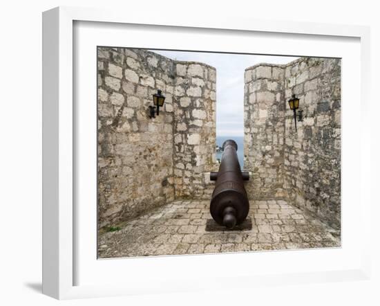 Croatia, Hvar. Cannon overlooking the town and coastline from Hvar Fortica or Spanjola Fortress.-Julie Eggers-Framed Photographic Print
