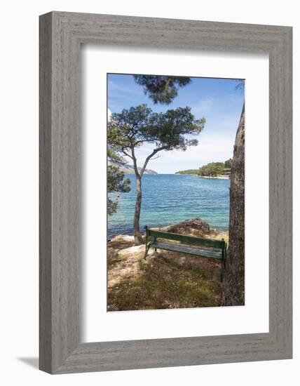 Croatia, Hvar Island, Stari Grad. Picturesque waterfront spot for bench.-Trish Drury-Framed Photographic Print