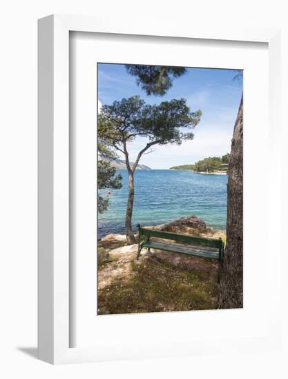 Croatia, Hvar Island, Stari Grad. Picturesque waterfront spot for bench.-Trish Drury-Framed Photographic Print