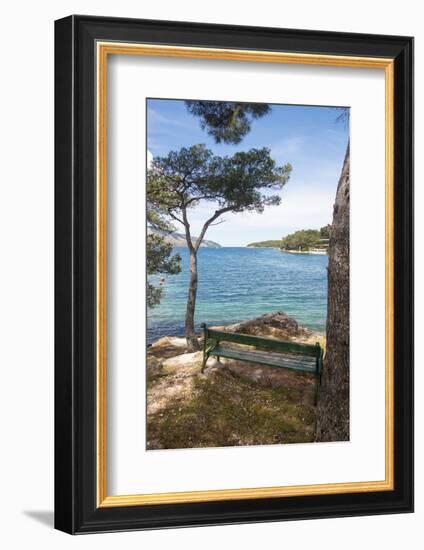 Croatia, Hvar Island, Stari Grad. Picturesque waterfront spot for bench.-Trish Drury-Framed Photographic Print