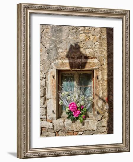 Croatia, Rovinj, Istria. Colorful bouquet of flowers decorate an old window.-Julie Eggers-Framed Photographic Print