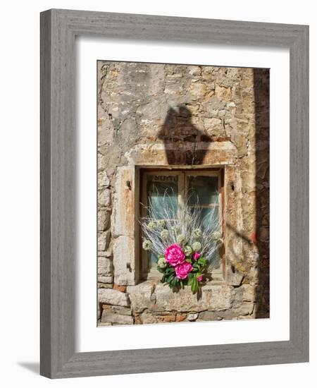 Croatia, Rovinj, Istria. Colorful bouquet of flowers decorate an old window.-Julie Eggers-Framed Photographic Print