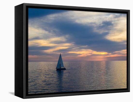 Croatia, Rovinj, Istria. Sailing boat on the Adriatic Sea outside the harbor of Rovinj at sunset.-Julie Eggers-Framed Premier Image Canvas