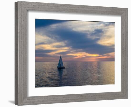 Croatia, Rovinj, Istria. Sailing boat on the Adriatic Sea outside the harbor of Rovinj at sunset.-Julie Eggers-Framed Photographic Print