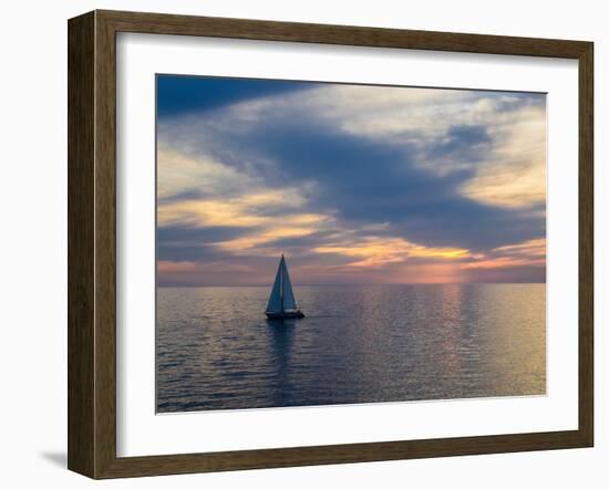 Croatia, Rovinj, Istria. Sailing boat on the Adriatic Sea outside the harbor of Rovinj at sunset.-Julie Eggers-Framed Photographic Print