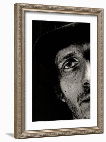 Cropped Portrait of a Man with Hat Starring into the Camera-Torsten Richter-Framed Photographic Print