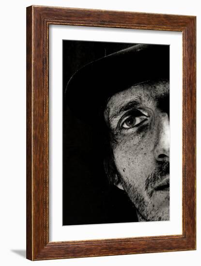 Cropped Portrait of a Man with Hat Starring into the Camera-Torsten Richter-Framed Photographic Print