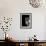 Cropped Portrait of a Man with Hat Starring into the Camera-Torsten Richter-Framed Photographic Print displayed on a wall