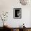 Cropped Portrait of a Man with Hat Starring into the Camera-Torsten Richter-Framed Photographic Print displayed on a wall