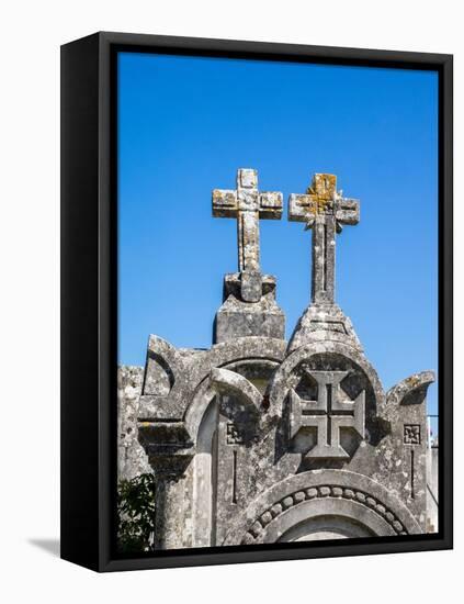 Cross at the top of an ancient gravestone in the cemetery at the Castelo de Ourem, Portugal.-Julie Eggers-Framed Premier Image Canvas