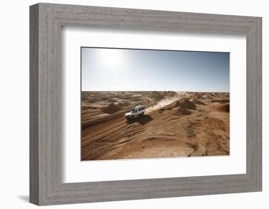 cross country vehicle between the opal mines in Coober Pedy, outback Australia-Rasmus Kaessmann-Framed Photographic Print