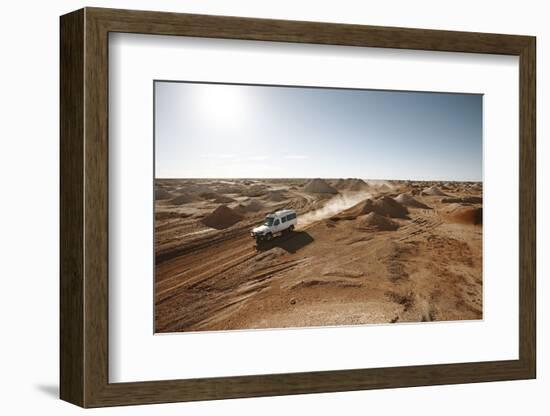 cross country vehicle between the opal mines in Coober Pedy, outback Australia-Rasmus Kaessmann-Framed Photographic Print