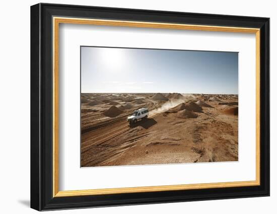 cross country vehicle between the opal mines in Coober Pedy, outback Australia-Rasmus Kaessmann-Framed Photographic Print