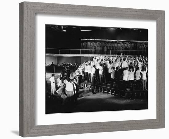 Crowd of Excited Traders at Stock Exchange-null-Framed Photo