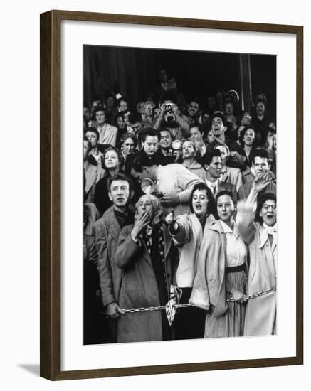 Crowd of Fans as Celebrities Arrive for the 26th Academy Awards at the RKO Pantages Theater-George Silk-Framed Premium Photographic Print