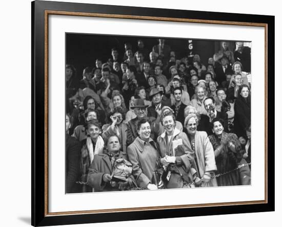 Crowd of Fans Watching Celebrities Arrive for the 26th Academy Awards at the RKO Pantages Theater-George Silk-Framed Premium Photographic Print