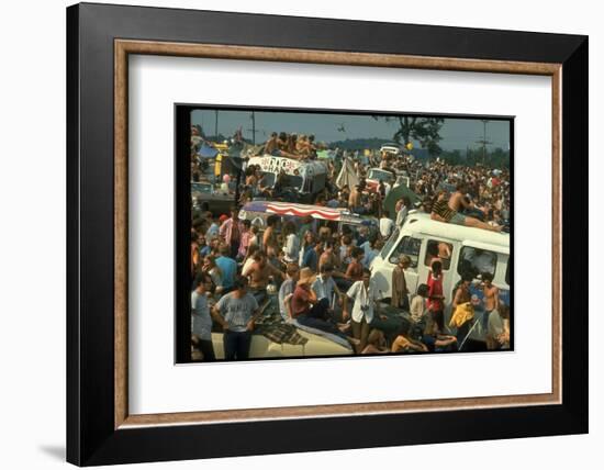 Crowd of people, some Sitting on Top of Cars and Busses, During the Woodstock Music/Art Fair-John Dominis-Framed Photographic Print