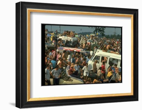 Crowd of people, some Sitting on Top of Cars and Busses, During the Woodstock Music/Art Fair-John Dominis-Framed Photographic Print