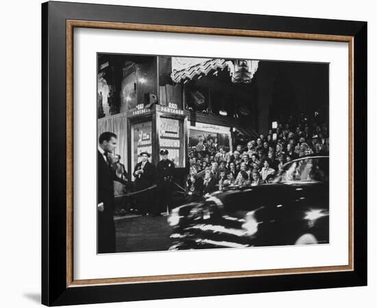 Crowd Watching From Bleacher Seats Set Up on the Right Side of Entrance to the RKO Pantages Theatre-Ed Clark-Framed Photographic Print