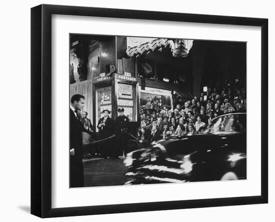 Crowd Watching From Bleacher Seats Set Up on the Right Side of Entrance to the RKO Pantages Theatre-Ed Clark-Framed Photographic Print