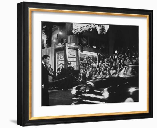 Crowd Watching From Bleacher Seats Set Up on the Right Side of Entrance to the RKO Pantages Theatre-Ed Clark-Framed Photographic Print