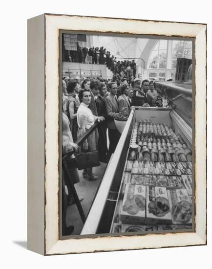 Crowds Checking Out Frozen Foods at the Us Exhibit, During the Poznan Fair-Lisa Larsen-Framed Premier Image Canvas