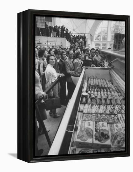 Crowds Checking Out Frozen Foods at the Us Exhibit, During the Poznan Fair-Lisa Larsen-Framed Premier Image Canvas