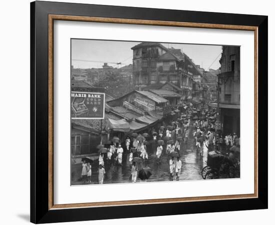 Crowds under Umbrellas on Street Outside Bombay Cotton Exchange During Monsoon Season-Margaret Bourke-White-Framed Photographic Print