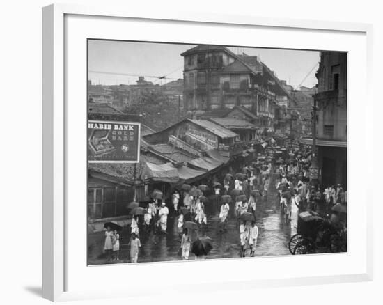 Crowds under Umbrellas on Street Outside Bombay Cotton Exchange During Monsoon Season-Margaret Bourke-White-Framed Photographic Print