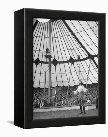 Crowds Watching a Circus Performer-Yale Joel-Framed Premier Image Canvas